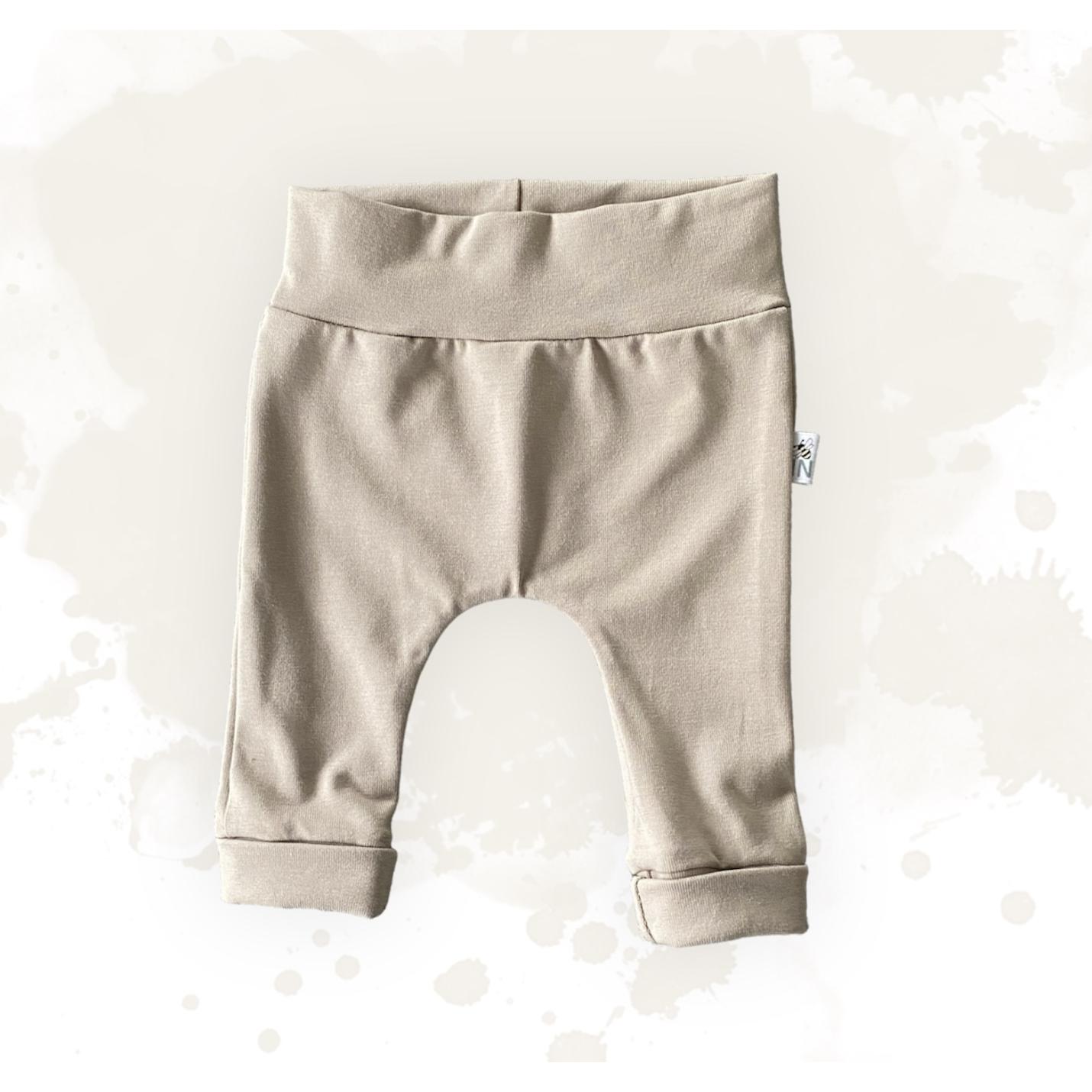 babybroek beige veerjes