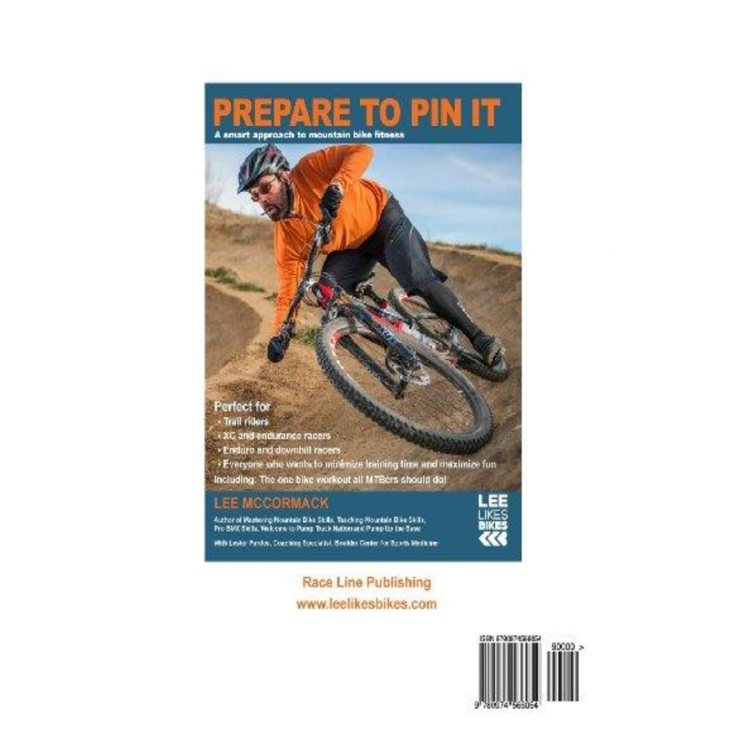 Op de cover van het tijdschrift "Prepare to Pin It: A smart approach to mountainbike fitness: 2" is te zien hoe Lee McCormack een dynamische mountainbikemanoeuvre uitvoert op een onverharde weg.