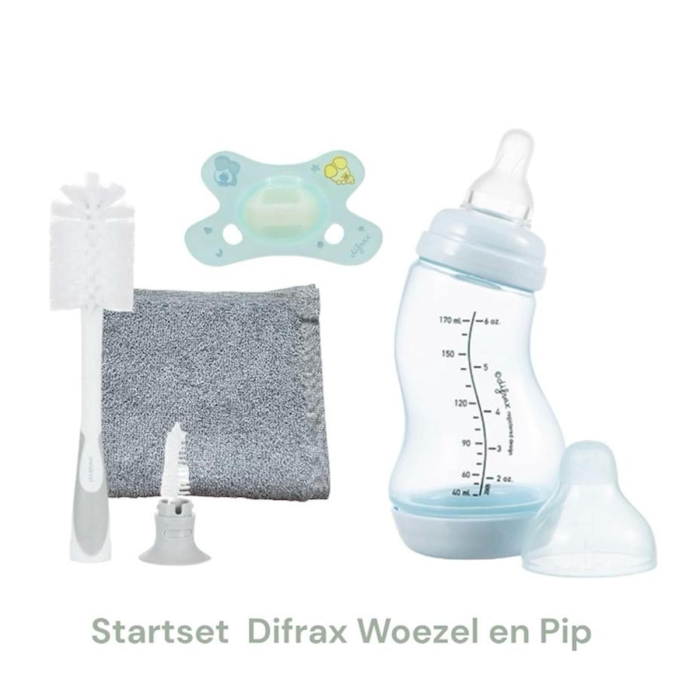 Startset Difrax Woezel en Pip bestaat uit een difrax fles blauw, woezel en pip speen, flessenborstel en grijs spuugdoekje